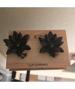 The Icing black jet clip on earrings - $358.13 MXN