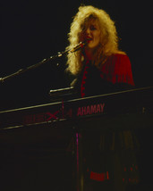 Nancy Wilson on stage playing piano with Heart singing 16x20 Poster - £15.94 GBP