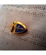 Older gold colored pin with cross on blue field; lamp above - $9.00