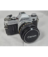 AS IS Canon AE-1 35mm SLR Film Camera with Canon 50mm 1:14 Lens - $137.08 CAD