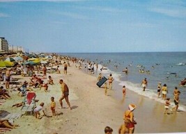 Rehoboth Beach Delaware Postcard Rafting Swimmers Sun Bathers Beach Ocean - £9.22 GBP