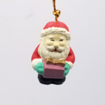 Vintage Christmas Ornament Mini Miniature Santa Claus holding Gift Present PVC - £7.01 GBP