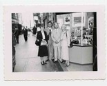 2 Couples Posing in Front of a Camera Store Photo - $11.88