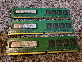 Quantity of Three Kingston KPN424-ELG 1G RAM Sticks - $18.00