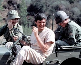 M.A.S.H. Loretta Swit Alan Alda Gary Burghoff sit in Jeep 24x30 inch Poster - £23.79 GBP