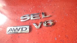 06-08 Ford Freestyle SEL V6 AWD Emblem Letters Logo Badge Trunk Rear Chrome OEM - $11.69