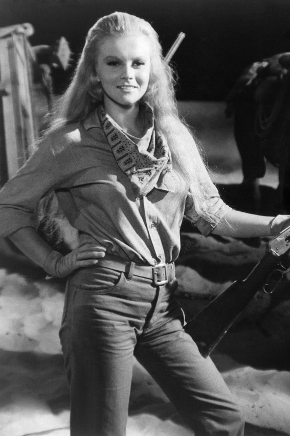 Primary image for Ann-Margret In The Train Robbers 24x18 Poster Posing With Rifle Smiling Hands