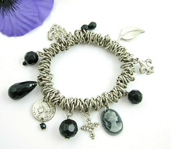 Springy Charm Bracelet Vintage Cameo Leaf Black Beads Fleur De Lis Silvertone - $18.99