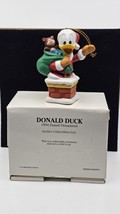 Grolier Vintage Disney Donald Duck Christmas Ornament Santa Dated 1994 W... - €14,56 EUR Grolier Vintage Disney Donald Duck Christmas Ornament Santa Dated 1994 W... - €14,56 EUR