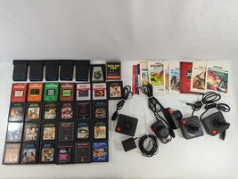 Atari 2600 Game &amp; Controller LOT Paddles Joysticks Manuals Solar Fox War... - £86.99 GBP