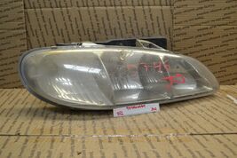 1996-1998 Pontiac Grand AM Right Passenger OEM Head Light 302-8e1 -Y - $24.49