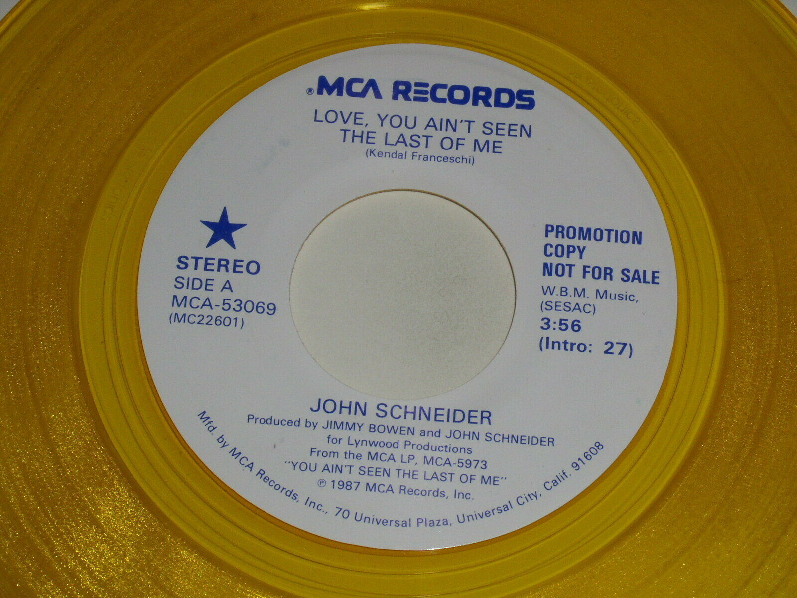 Primary image for John Schneider Love You Ain't Seen The Last Yellow Vinyl 45 Rpm Record MCA Promo
