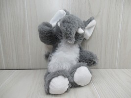 Small plush elephant gray white tummy tusks ears feet shaggy fur trunk goes down - $7.27