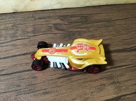 2012 Hot Wheels Radical Racer Gold and Red  - $8.44