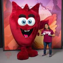 Maroon Heart mascot costume character dressed with a Flare Jeans and Watches - £990.08 GBP