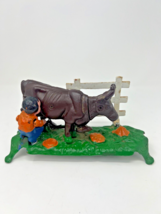 Vintage Cast Iron Mechanical Coin Bank Milking Cow (The book of knowledge) - $39.60