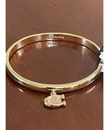 Coach charm Hinged  bangle bracelet peach colored stone and gold New - $33.66