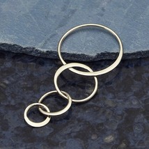 Sterling Silver Four Circles of Life Link Pendant 42x19mm - $269.89 MXN