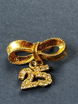 Vintage Small Goldtone Ribbon Bow w Clear Rhinestone Encrusted 25 Charm Dangle - £10.46 GBP