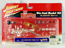 Johnny Lightning The Munsters Drag-U-La Car Gold Diecast Model Kit 1/64 ... - £15.56 GBP