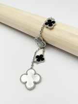 Mixed Mother of Pearl and Onyx Quatrefoil Motif Charm Bracelet in Silver - £58.80 GBP