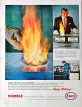 Humble oil burns on ice ENCO  happy motoring 1964 Vintage Print Ad - $10.35