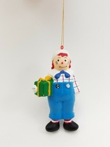 Vtg Rag Doll Andy Ornament 3.75in Holding a Christmas gift. Blue overall... - $9.80