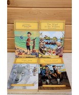 Lot of 4 Classic Books PB Pinocchio White Fang Treasure Island 2011 DMP - $27.34 CAD