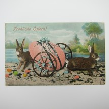 Easter Postcard Rabbits Cart Colored Eggs Pink Blue Flowers River Bank Antique - £7.97 GBP