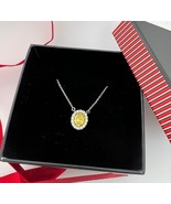 Authenticity Guarantee

1.65ctw Double Halo Oval Fancy Yellow Diamond Ne... - $2,747.05 CAD