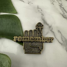Vintage 80s Brass Metal Remember Fridge Magnet Finger String Novelty - $15.83