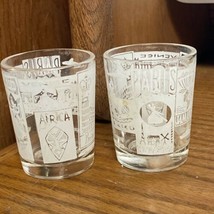 2 Shot glass White graphics Paris Holland Africa Venice Britain Mexico Travel - £13.92 GBP