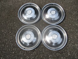 Genuine 1974 to 1976 Pontiac Lemans 14 inch hubcaps wheel covers - $37.05
