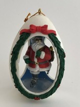Vintage 1991 National Rennoc Santa Skating In 3&quot; Egg Ornament - £9.56 GBP