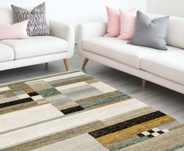 10&#39; X 13&#39; Beige Gold Black Grey Tan Teal and Rust Geometric Power Loom Area Rug - $2,906.59