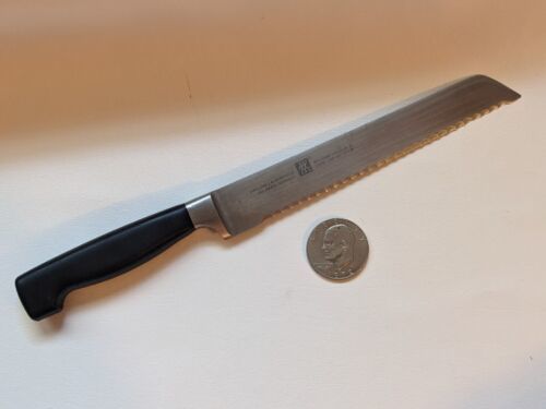 Primary image for Zwilling Henckels Four Star 8" Serrated Bread Knife Germany 31076-200 Sharp