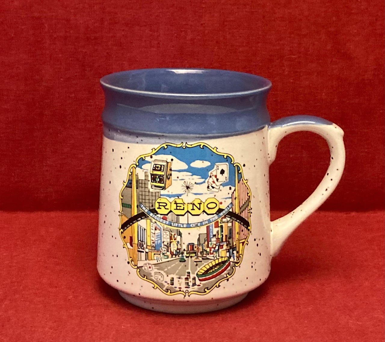 Vintage Reno Nevada souvenir mug speckled stoneware with blue coffee cup - $6.00
