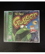 Frogger Sony PlayStation With Book 1997 - Front Of Case Is Cracked - $218.29 MXN