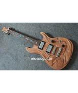 Musoo brand hand carved electric guitar with dragon design - $4,681.87 MXN