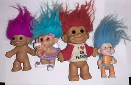 Russ Troll Lot Of 4 Red Purple Blue holding Baby - £23.70 GBP