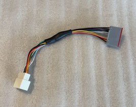 Wiring adapter. Put Ford phase 2 radio in world plug vehicle. Crown Vic PPV - $39.00