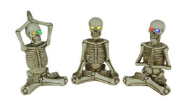 Bone Stretchers Yoga Skeleton Figurines with Color Changing LED Eyes Set of 3 - £34.42 GBP