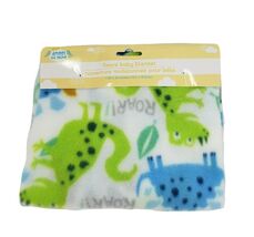 An item in the Baby category: NEW ANGEL OF MINE FLEECE BABY BLANKET 30" x 30" WHITE W/ GREEN BLUE DINOSAURS