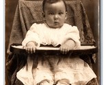 RPPC Adorable Bewildered Baby Sitting in High Chair Studio View UNP Post... - £3.12 GBP