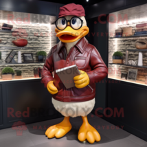 Maroon Duck mascot costume character dressed with a Leather Jacket and Reading g - £985.96 GBP