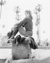 Donna Douglas by Palm Trees Shoot for Beverly Hillbillies 16x20 Poster - £15.97 GBP