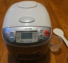 Zojirushi NS-TGC10 5-Cup Rice Cooker and Warmer, Porridge &amp; Cake Cooker - $63.04
