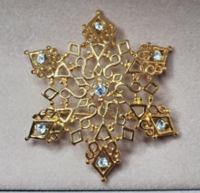 Snowflake Pin Goldtone Filigree Rhinestones 2 1/8&quot; Brooch Winter Christmas - £7.41 GBP