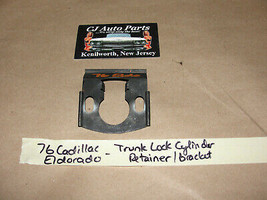 OEM 76 Cadillac Eldorado TRUNK LOCK CYLINDER RETAINER CLIP MOUNTING BRACKET - $39.59