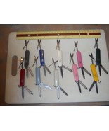Lot  10 Classic SD Victorinox Swiss Army knives. No Ads,  a collage of c... - £34.22 GBP